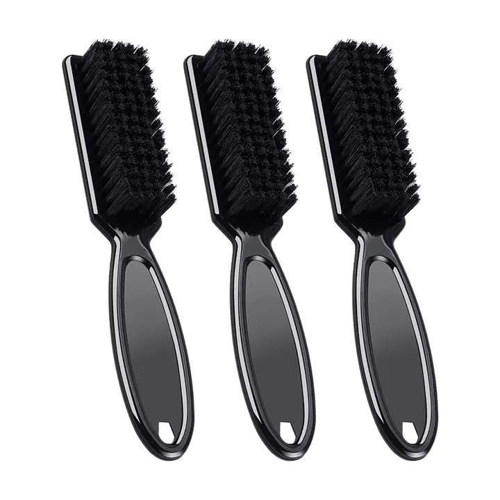 A set of three black professional duster brushes for neck and facial hair