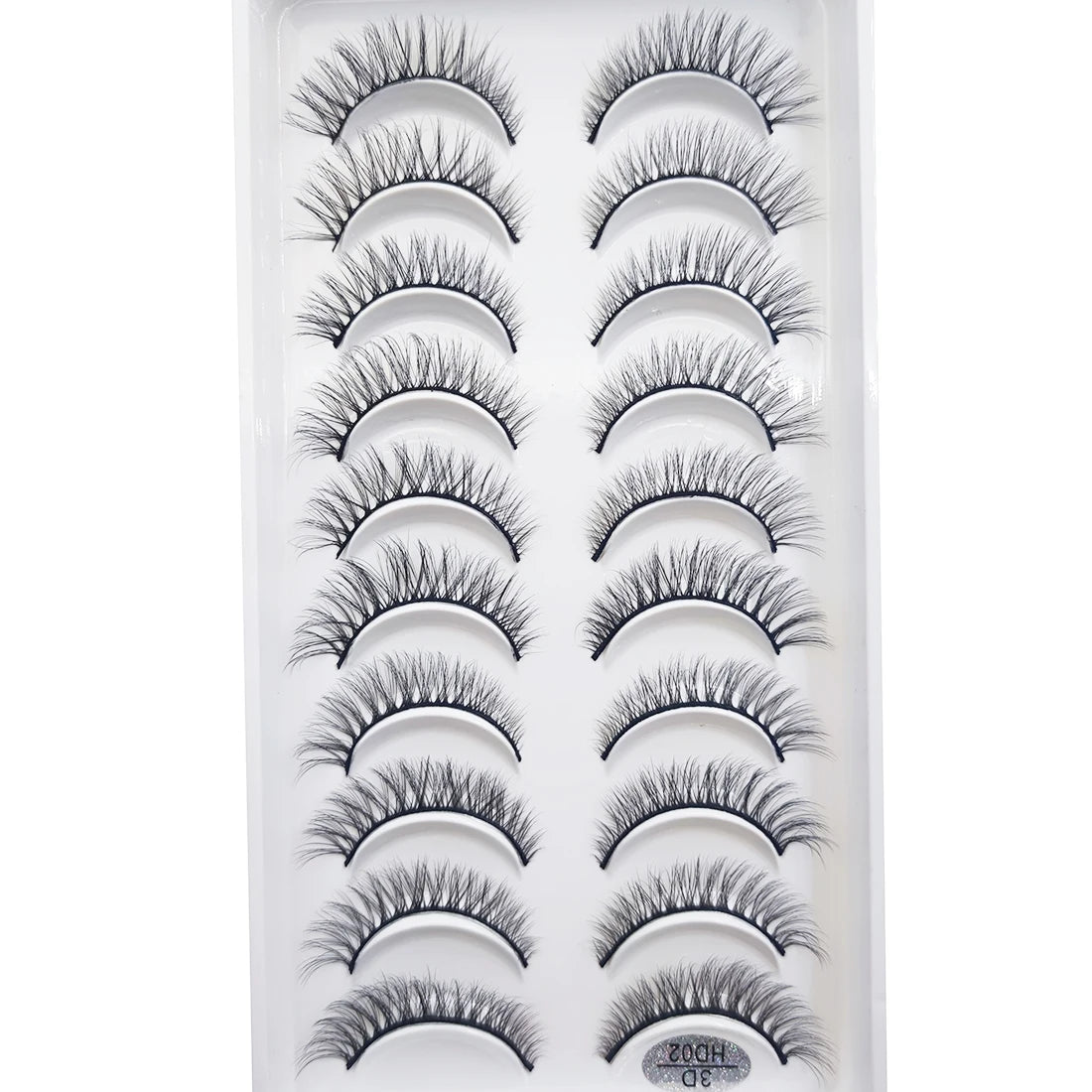 A plastic case containing various styles of natural 3D mink false eyelashes.