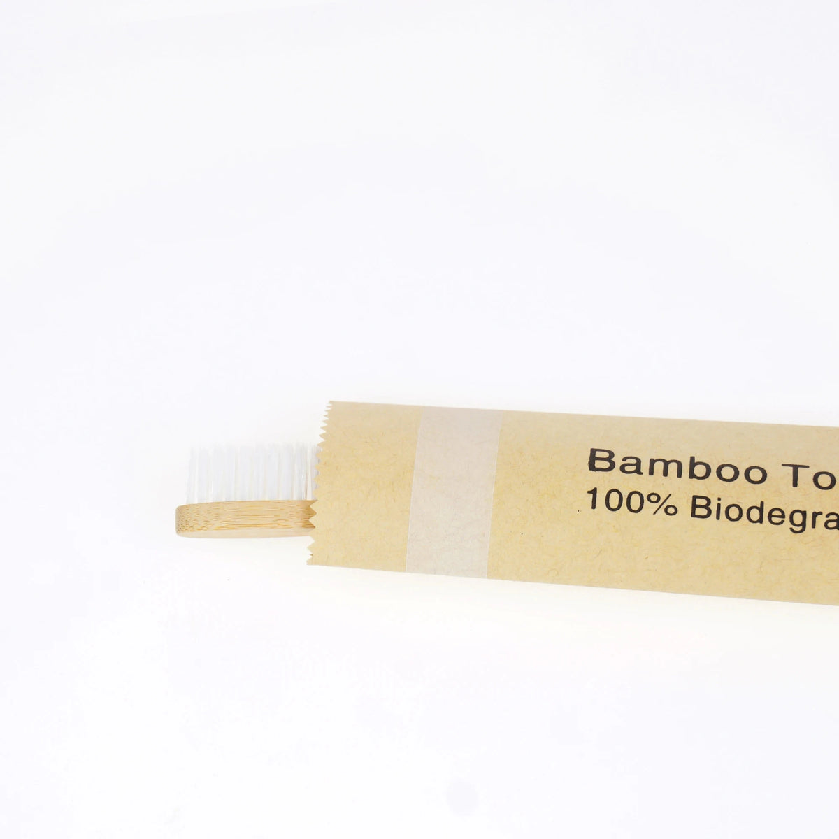 A package of bamboo toothbrushes with soft bristles labeled 100% biodegradable.