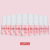 A set of ten tubes of fast-drying glitter nail glue for acrylic art in pink packaging.