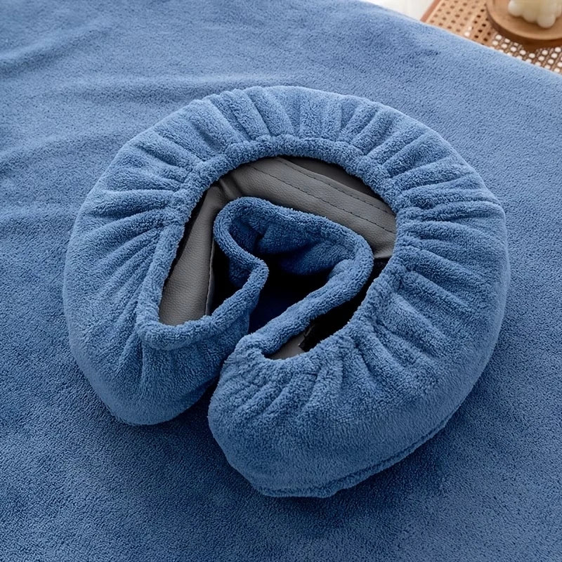 A blue, reusable U-shaped fabric pillow cover designed for massage and beauty.