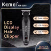 A black Kemei KM-2293 LCD display hair clipper with a high-strength blade shown against a dark background.