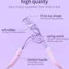 A purple precision eyelash curler with a soft rubber grip and spring assist mechanism shown for curling eyelashes.