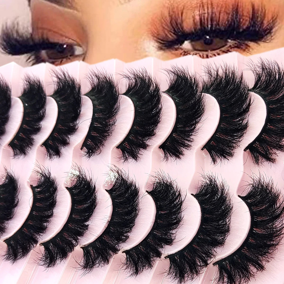 A close-up of natural mink striped false eyelash extensions in various shades and styles.