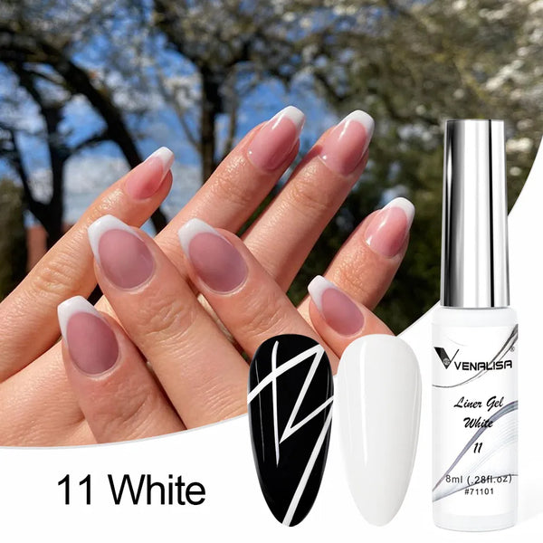 A hand displays a white nail design using a professional UV nail art gel polish kit.