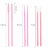 A set of pink disposable makeup brush applicators shown with various sizes and lengths.