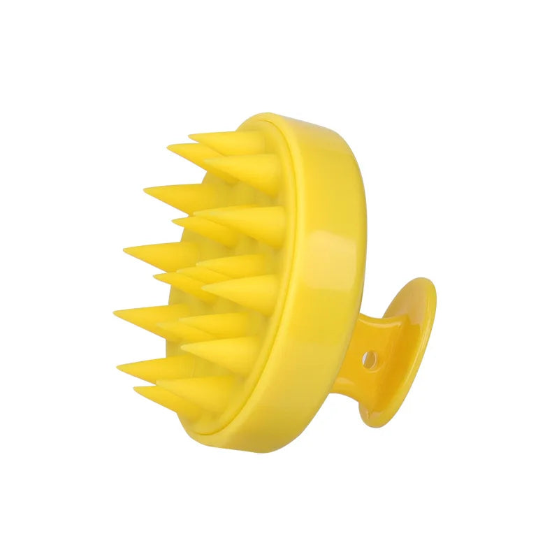Yellow silicone scalp massage and body brush with multiple protruding bristles