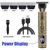 A professional cordless hair trimmer with various guard sizes, a cleaning brush, and a USB cable connected to a power display