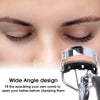Stainless steel eyelash curler with a precision comb shown near a person's eye.