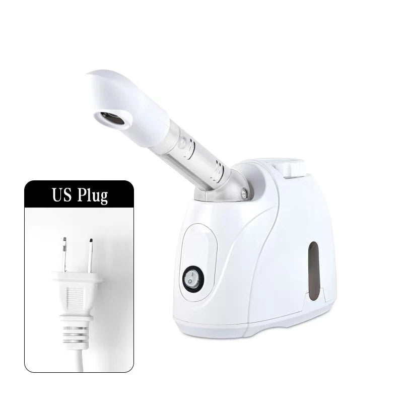 A white hot mist facial steamer device with a rotating nozzle and an US plug adapter.