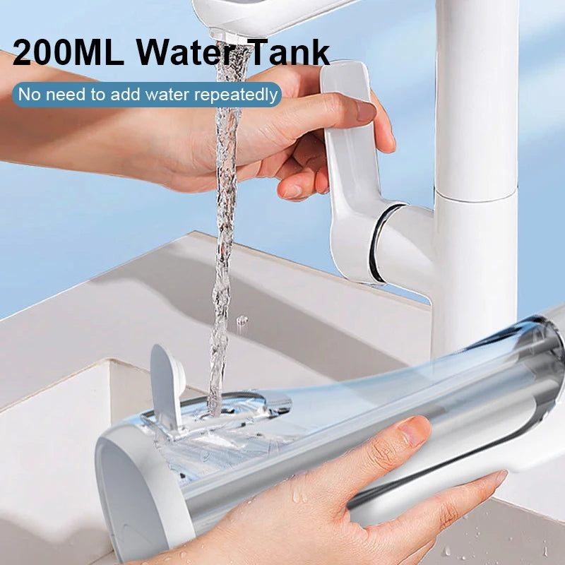 A hand is pouring water into a 200ML water tank of a portable electric oral irrigator.