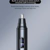 A black professional edition nose hair trimmer with a silver blade and digital display is shown on a dark surface.