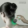 A hand is applying a mini portable massage gun to the back of a person's neck, demonstrating a damping design for a comfortab