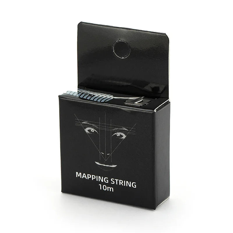 A black box containing a mapping string with a thread for microblading