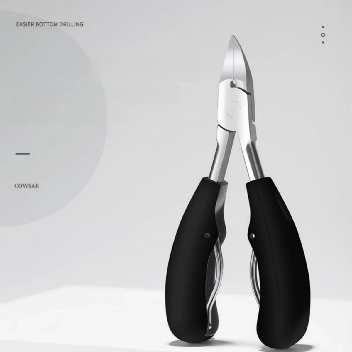 A pair of black professional toenail clippers with a curved sharp blade shown against a light gray background.