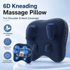 A dark blue 6D kneading massage pillow with soft massage heads and an ergonomic contour shown on a white surface.