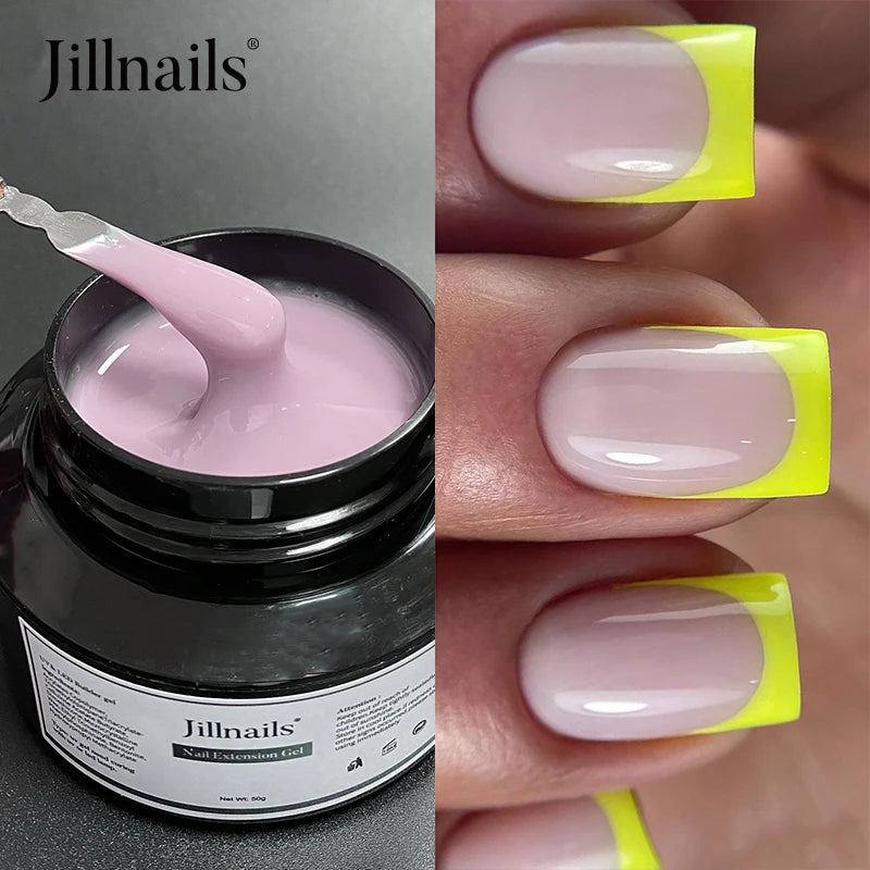 Gel d'extension de ongles Jillnails, couleur rose avec pointe jaune, appliqué sur un doigt.
