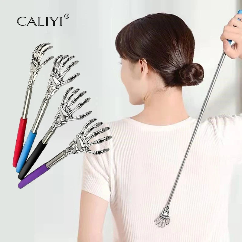 A woman is using a stainless steel telescoping back massager with multiple fingers to massage her back.