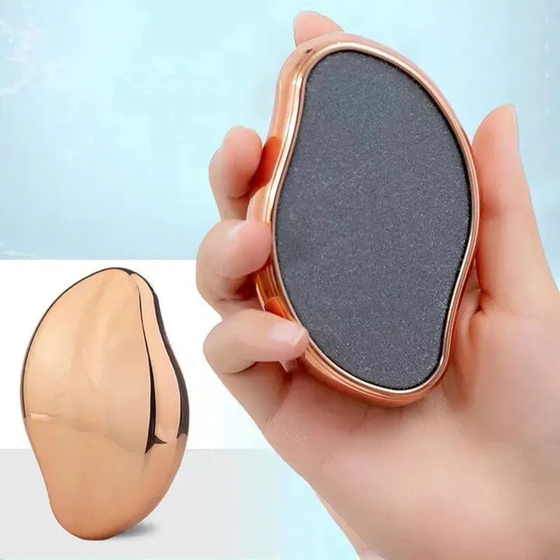 A hand holds a portable glass foot file and callus remover tool, showing the tool's oval shape and rose gold finish.