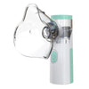 A clear handheld medical nebulizer device with a white and mint green body is shown.