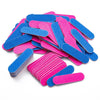 A pile of double-sided mini nail files in blue and pink colors.