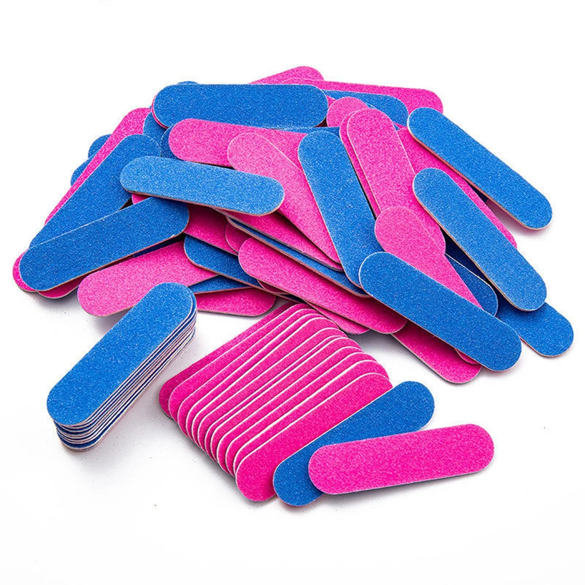 A pile of double-sided mini nail files in blue and pink colors.