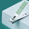 A stainless steel nail and brow grooming kit with a light green handle and a grid of tools resting on a white box.