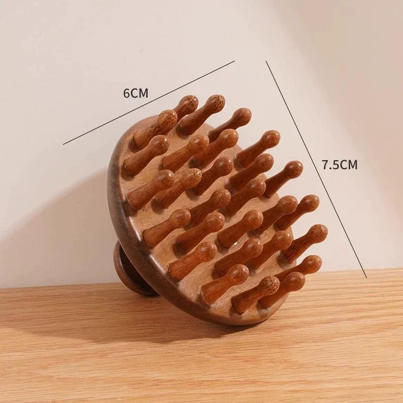A wooden massage comb with natural sandalwood therapy features 12 widely spaced, rounded teeth.