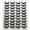 Plateau en plastique transparent contenant un kit de faux cils de mink naturels.