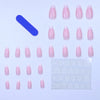 A collection of pink glossy press-on nails in an almond shape, including a blue applicator and a blister pack.