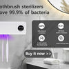 UV toothbrush sterilizers hanging on a wall with various toothbrushes and a display showing sterilization benefits