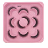 A pink tray containing a set of artificial mink eyelashes for eye extensions.