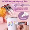 A hand applies B7000 Jewelry Adhesive Glue to a clear plastic cup, demonstrating its use for crafts.
