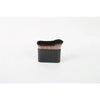 A black compact case holding a dense, dark brown makeup brush for tan and foundation.