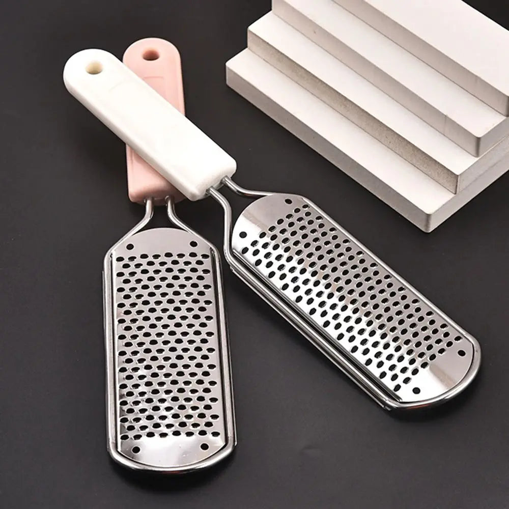 Stainless steel foot file with a pink handle and a perforated metal plate for callus removal