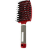 A red nylon bristle detangling comb with a metal handle is shown against a white background.