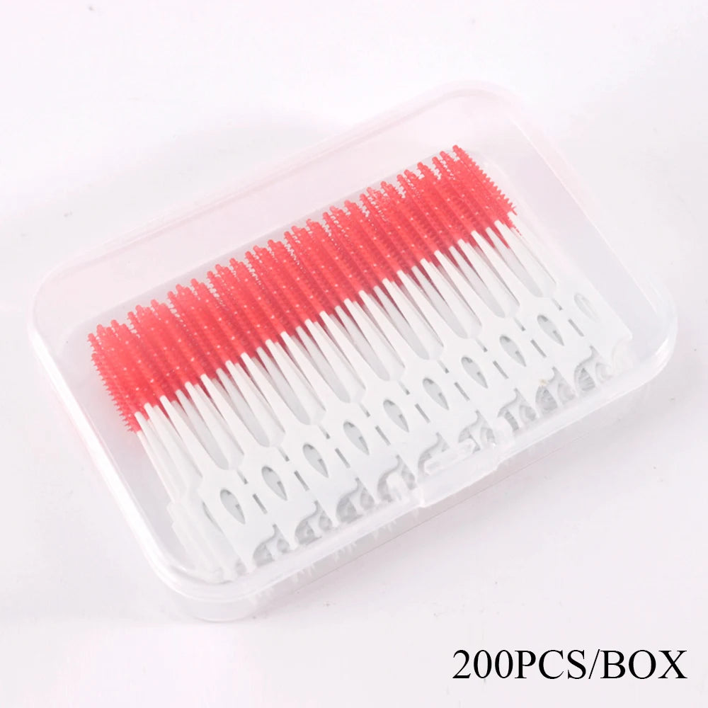 Una caja con 200 limpiadores de hilo dental de silicona para la higiene bucal.