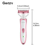 A pink and white electric shaver with a detachable head is shown next to dimension lines.