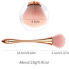 A rose gold dusting and makeup removal brush with a 4.5cm handle and bristles, measuring 15.5cm long.