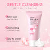 A tube of Japan Sakura Cleanser facial wash in pink is shown against a soft pink background.