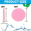Comparison of dry and wet compressed facial sponges showing their size difference.