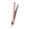 A pink ceramic hair straightener and curler tool shown in a vertical view.