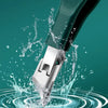 A close-up shot of a professional stainless steel nail clipper being used to cut a nail, creating water splashes on a teal ba