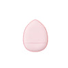 A pink mini finger puff foundation applicator tool with a textured surface.