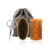 A set of boar bristle beard brush and comb with a wooden handle and a gray fabric gift bag.