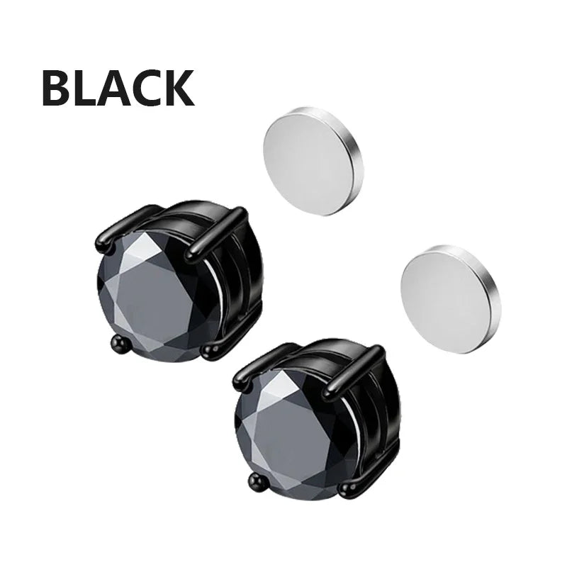 A pair of black crystal magnetic stud earrings for men shown with a separate silver stud.