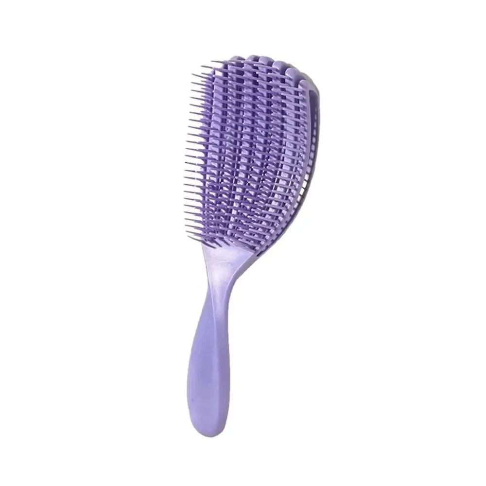 A purple massage detangler hair brush with fine bristles shown against a white background.