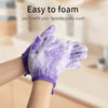Purple exfoliating bath gloves being used to foam a body wash