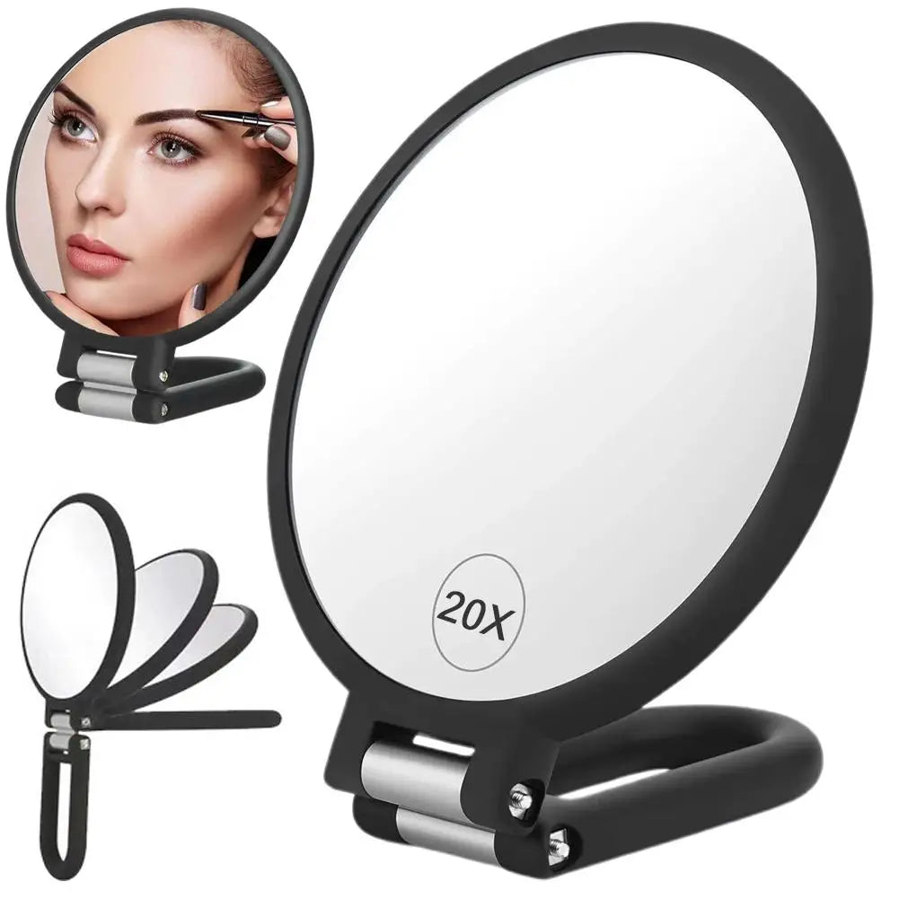 Miroir de voyage double face noir avec support et multiples angles de vue.