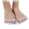 Soft gel toe separators placed on the soles of two feet for toe straightening and bunion relief.